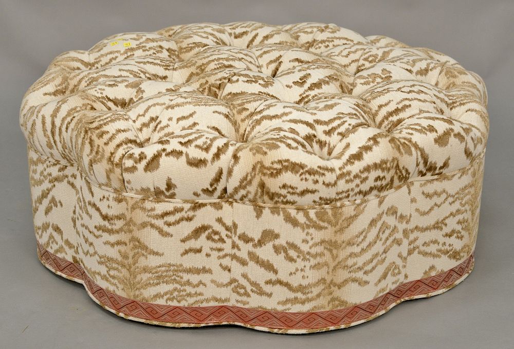 Appraisal: Button tufted upholstered ottoman scalloped form dia in Provenance From