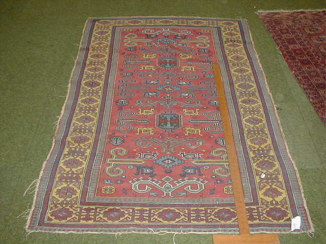 Appraisal: A Turkish design multi border rug with yellow banding and