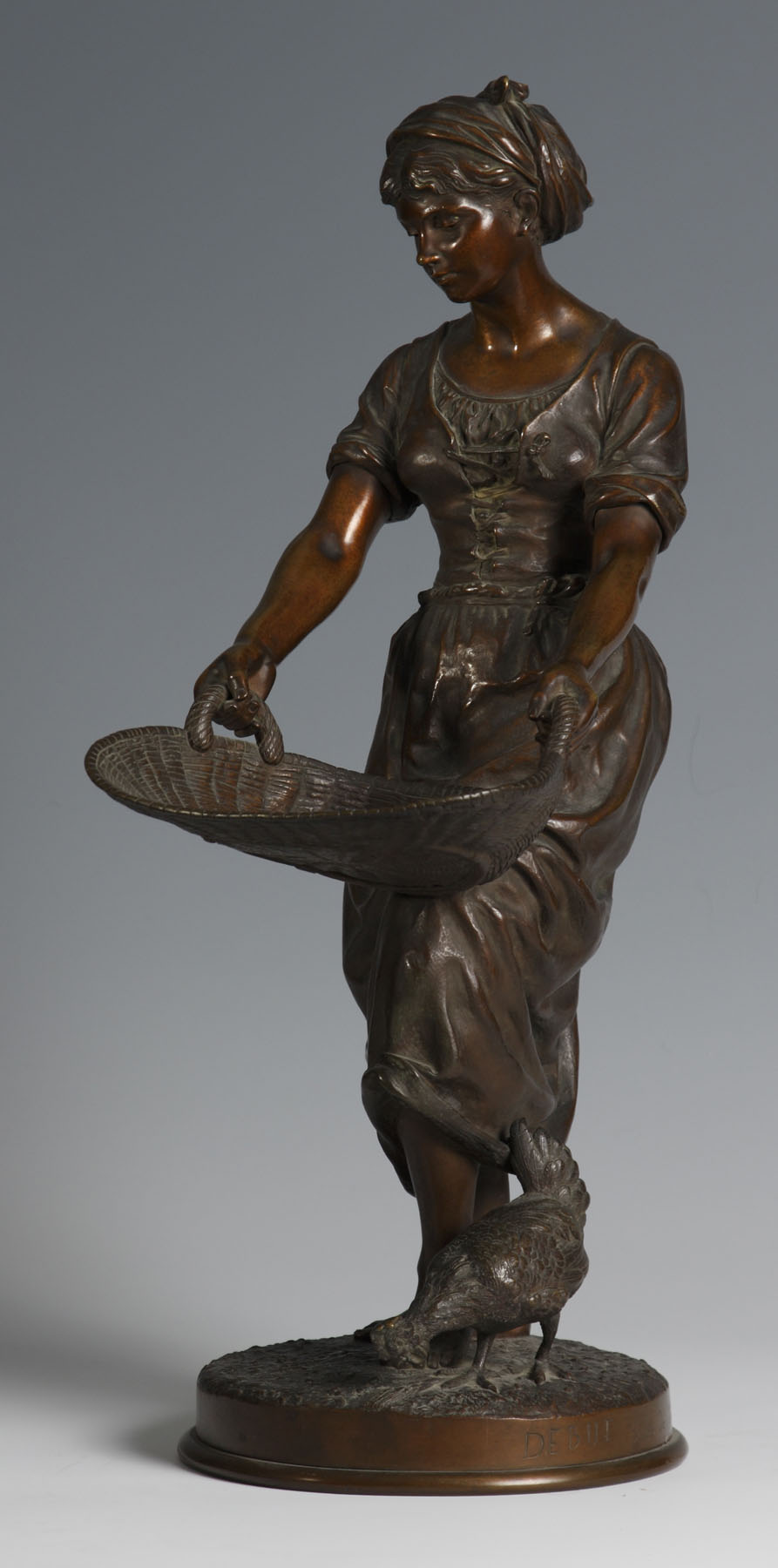 Appraisal: Debut Bronze Maiden w Basket Chicken Sgn Debut Condition Original