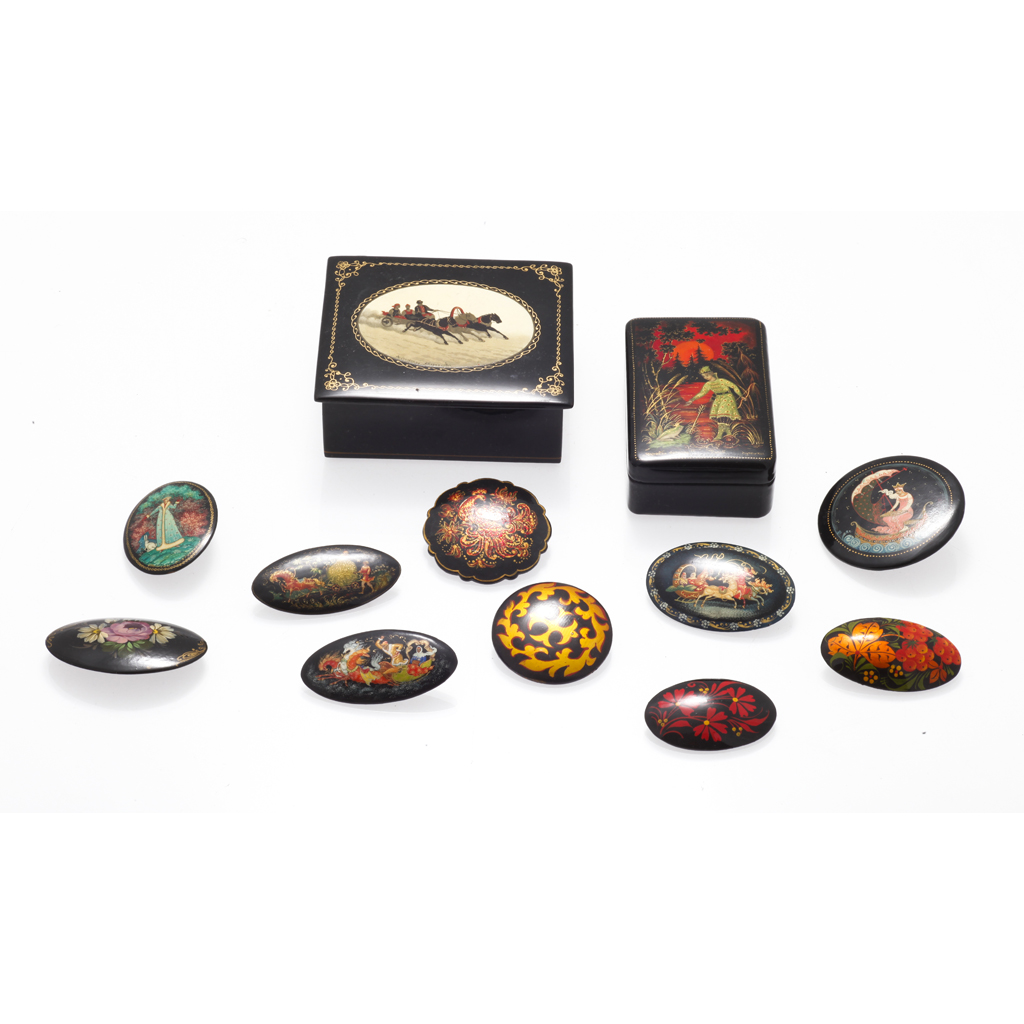 Appraisal: A collection of Russian papier mach brooches and boxes comprising