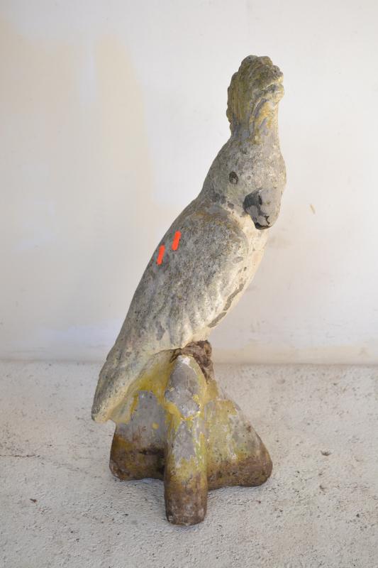 Appraisal: A MID CENTURY CONCRETE COCKATOO A MID CENTURY CONCRETE COCKATOO