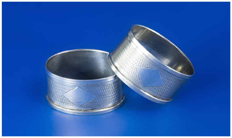 Appraisal: Pair Of Oval Silver Napkin Rings Engine Turned With Vacant