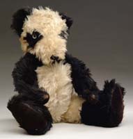 Appraisal: LARGE STUFFED PANDA BEAR Early to mid- th Century this