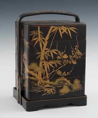 Appraisal: A Japanese Lacquer Lunch Box Black lacquerware lunch box constructed