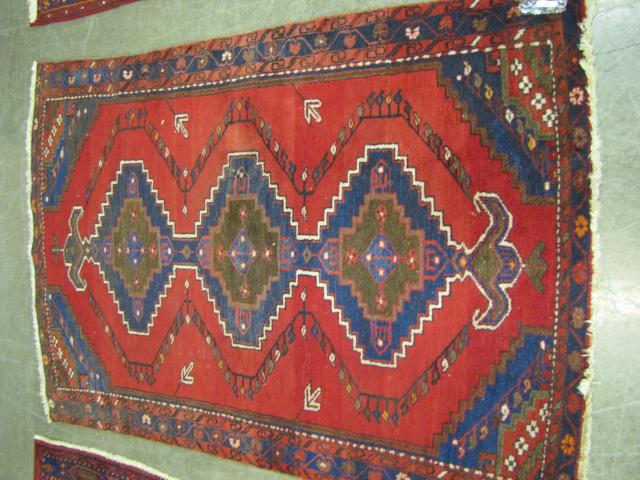 Appraisal: Oriental Rug approximately x feet geometric figures in tribal design