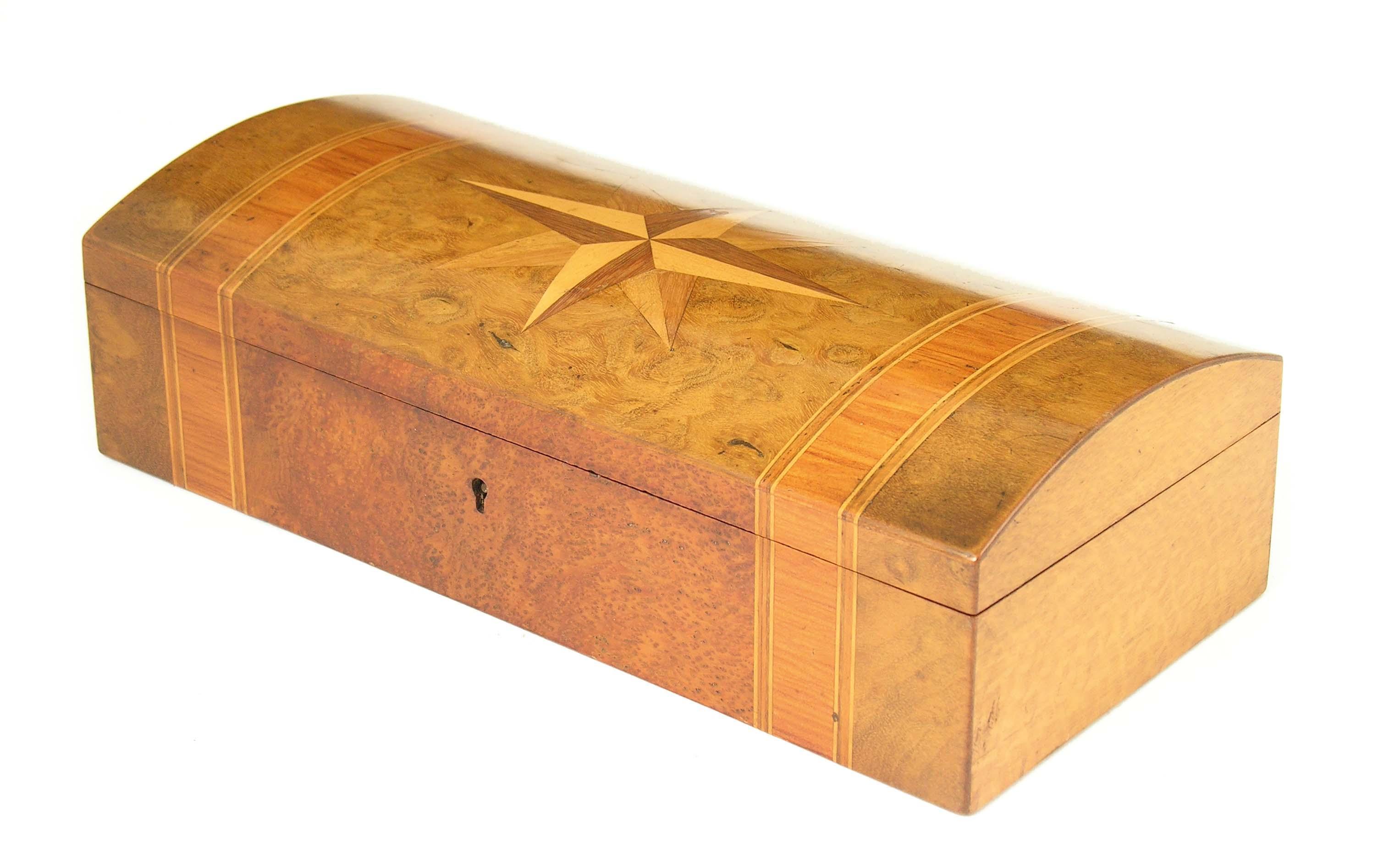 Appraisal: A New Zealand parquetry and specimen wood glove box by