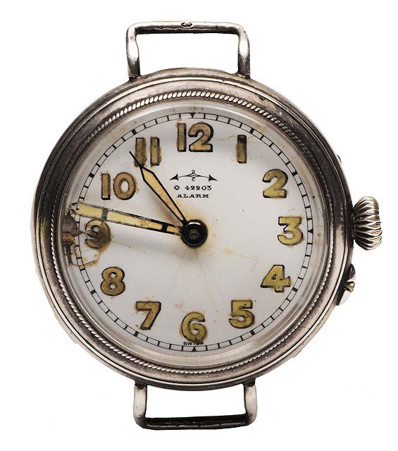 Appraisal: AN OLD SILVER ALARM WRIST WATCH with luminous Arabic numerals