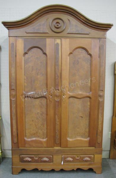 Appraisal: An antique Victorian walnut knockdown wardrobe with burl veneer applied