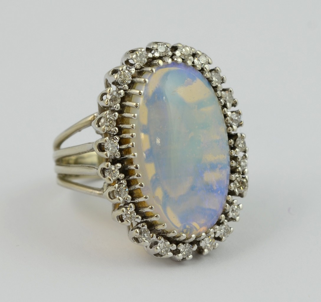 Appraisal: K white gold oval opal and diamond ring mm x