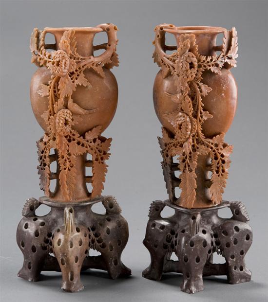 Appraisal: Pair of red carved soapstone single vases With climbing flowers