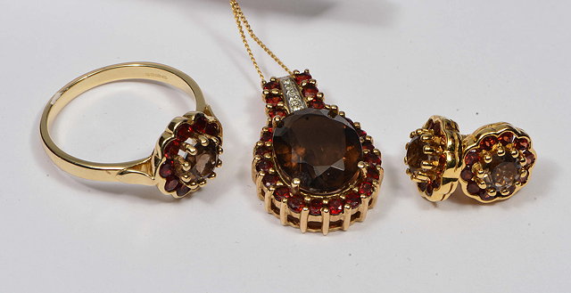 Appraisal: A CT GOLD PENDANT together with a matching ring and