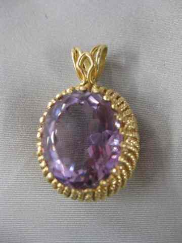 Appraisal: Amethyst Pendant carat oval gem in kyellow gold '' x