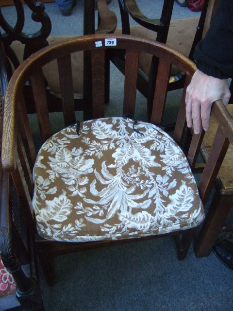 Appraisal: A late th century oak tub chair in the manner