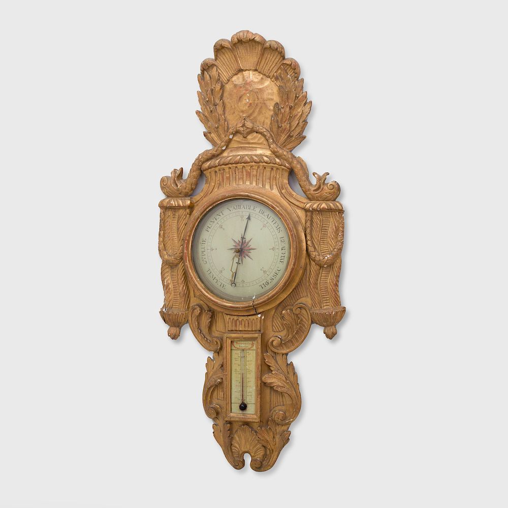 Appraisal: Louis XVI Giltwood Barometer and Thermometer Decorated with adorned dolphins