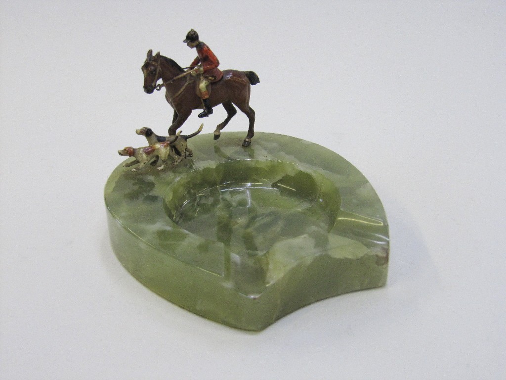 Appraisal: Onyx horseshoe ashtray mounted with a cold painted bronze huntsman