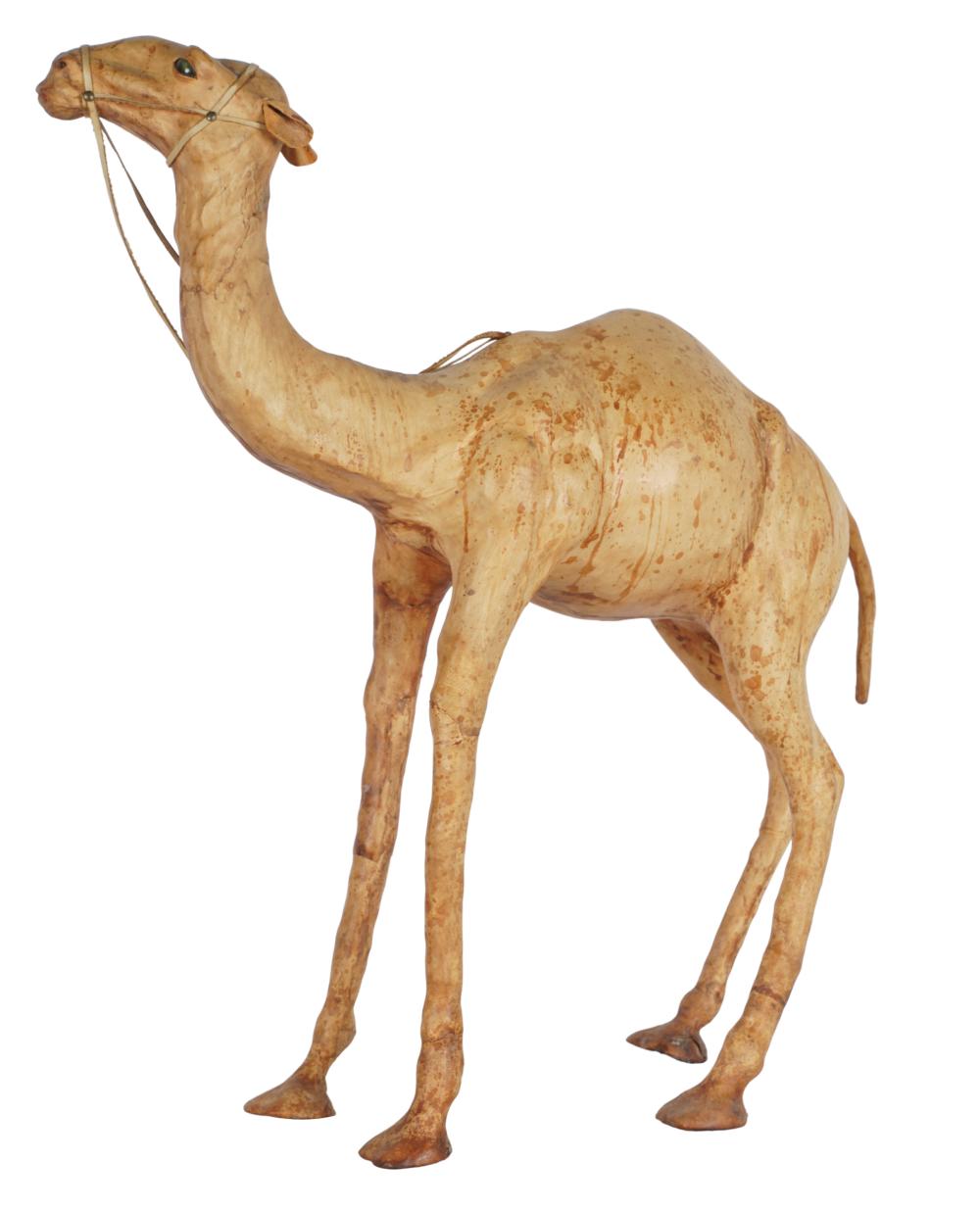 Appraisal: LEATHER FIGURE OF A CAMELwith glass eyes Condition discoloration throughout