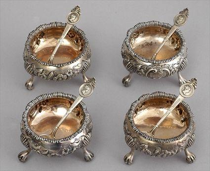 Appraisal: FOUR VICTORIAN MONOGRAMMED SILVER TRIPOD SALTS G F Pinell London