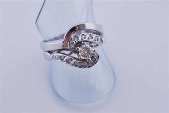 Appraisal: A SOLITAIRE DIAMOND RING WITH DIAMOND SET SHOULDERS TOGETHER WITH