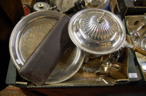 Appraisal: An ornate pair of ep fish servers a chafing dish