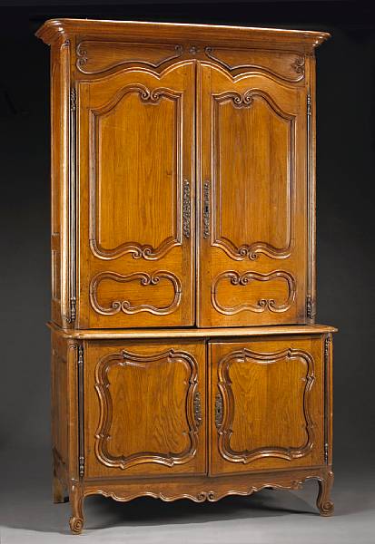 Appraisal: A Louis XV oak buffet deux corps In two parts