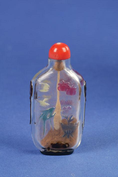 Appraisal: A SIX COLOUR GLASS OVERLAY BOTTLE decorated with a cat