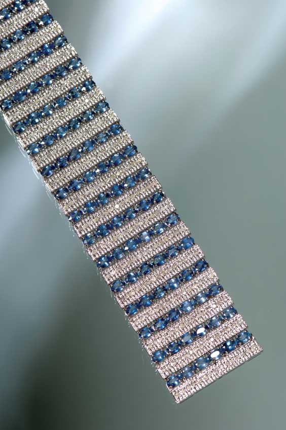 Appraisal: SAPPHIRE AND DIAMOND BRACELET K white gold mounted blue sapphire