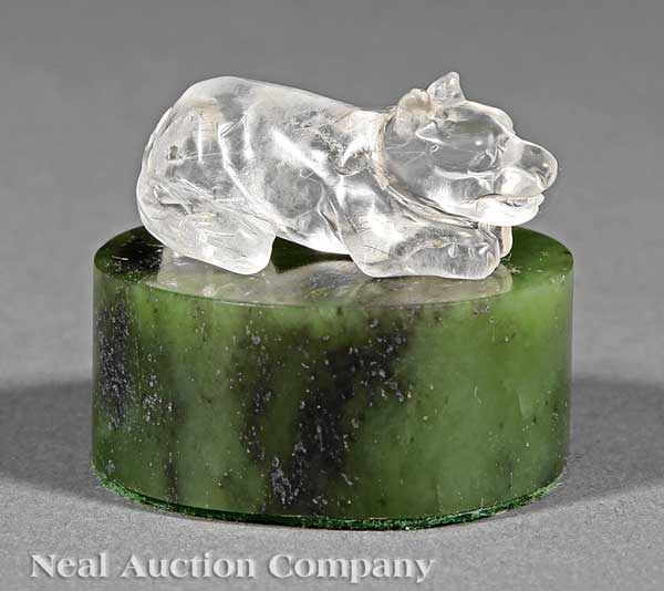 Appraisal: A Chinese Rock Crystal Dog and a Spinach Green Jade