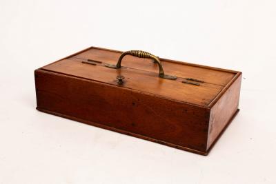 Appraisal: A th Century mahogany cutlery hod with two lidded compartments