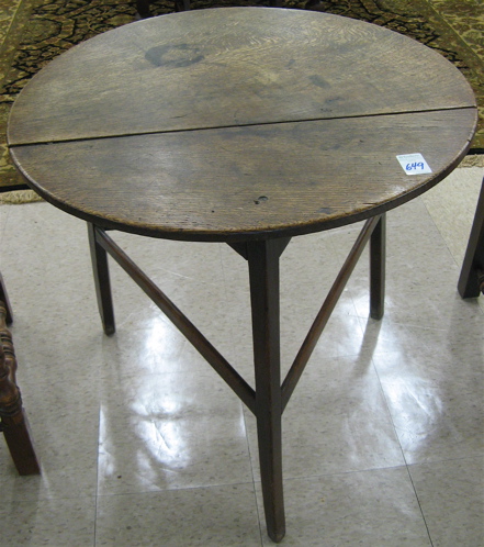 Appraisal: GEORGE III OAK TAVERN TABLE English th century having a