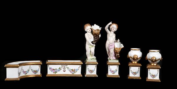 Appraisal: A sixteen piece Meissen style porcelain table garniture tallest height