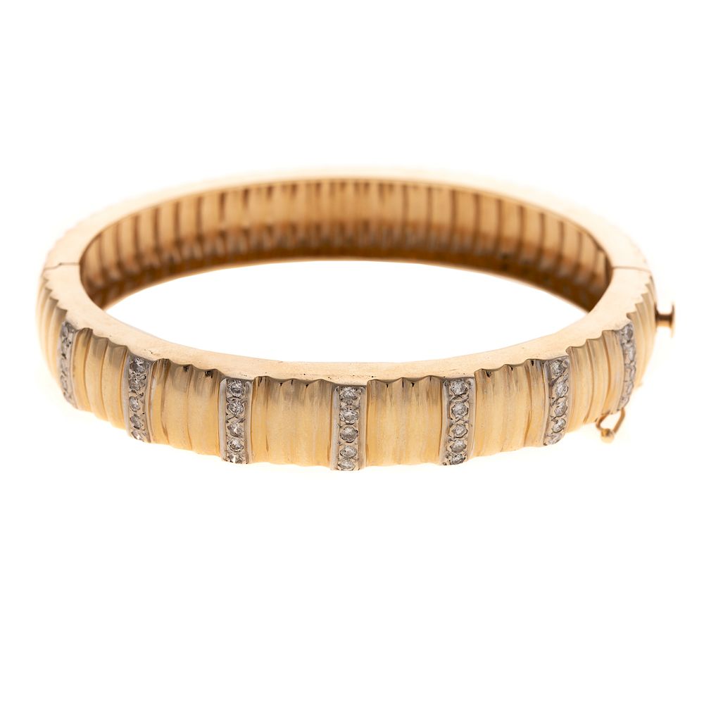 Appraisal: A Ladies Fluted Diamond Bangle Bracelet in K K yellow