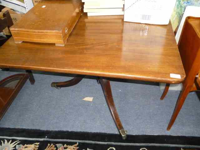 Appraisal: A SQUARE TOPPED MAHOGANY OCCASIONAL TABLE on tripod base and