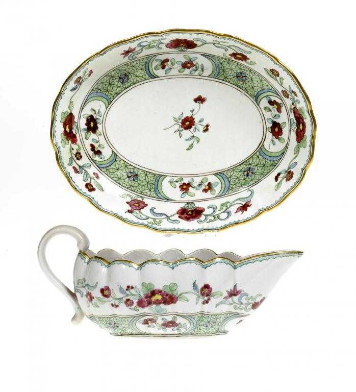 Appraisal: A DERBY FLUTED SAUCE BOAT AND OVAL DISH painted in