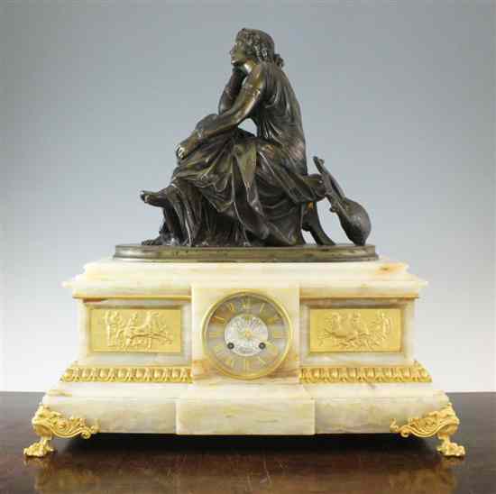 Appraisal: A Victorian bronze and ormolu mounted marble and onyx mantel