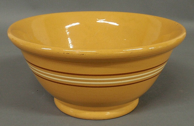 Appraisal: Large yellowware mixing bowl with brown and cream stripe decoration