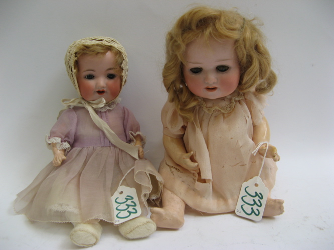 Appraisal: TWO GERMAN BISQUE HEAD GIRL DOLLS Heuback Koppelsdorf composition body