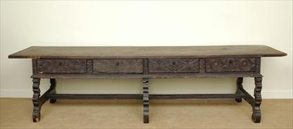 Appraisal: SPANISH WALNUT HUNT TABLE With a long rectangular top above