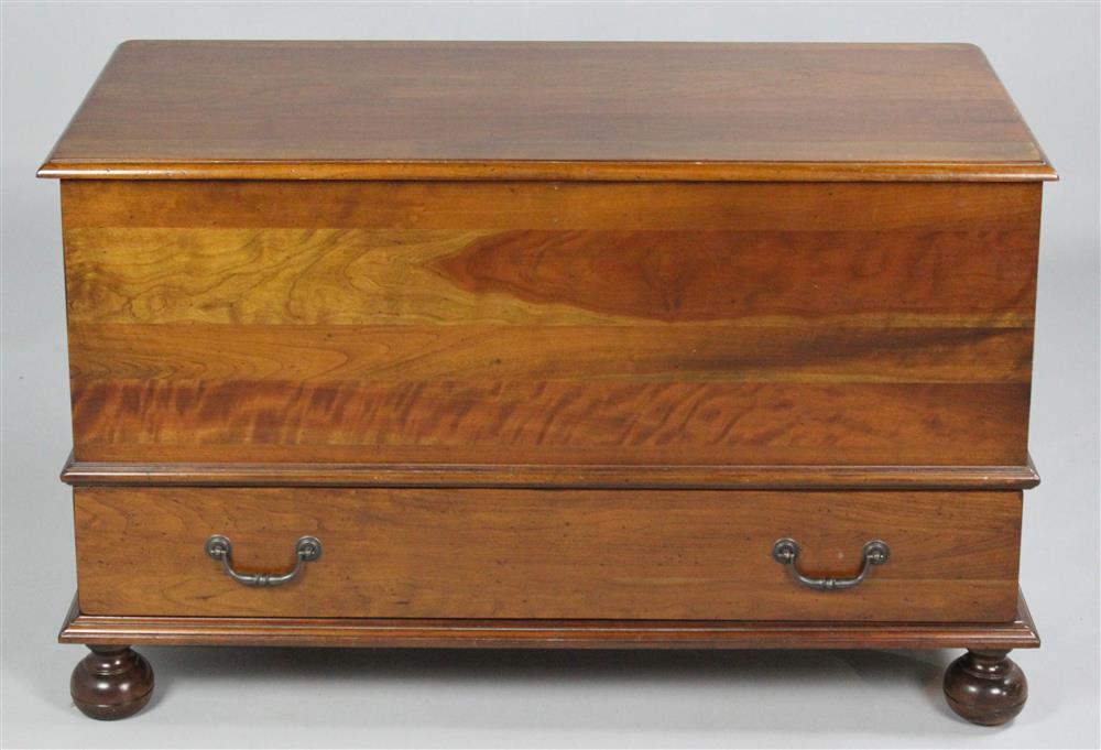 Appraisal: COLONIAL REVIVAL CHERRYWOOD BLANKET CHEST having a hinged rectangular top