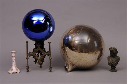 Appraisal: MERCURY GLASS GAZING BALL ON GOTHIC REVIVAL BRASS STAND Together