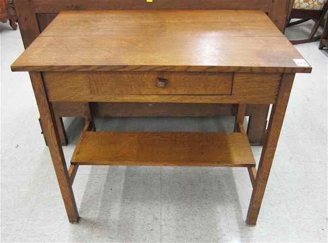 Appraisal: ARTS CRAFTS STYLE OAK LIBRARY TABLE American c having a