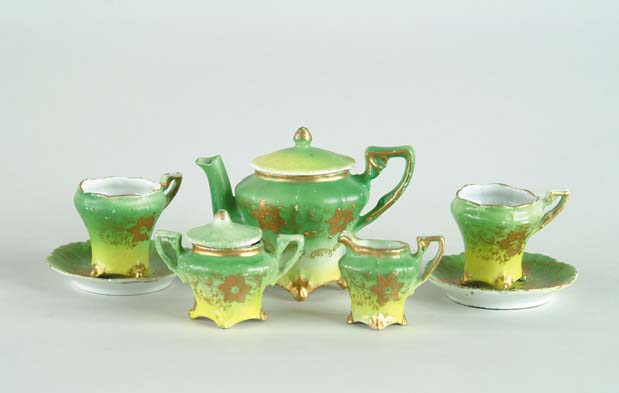 Appraisal: SEVEN PIECE HAND PAINTED DOLLS TEA SET Set consists of