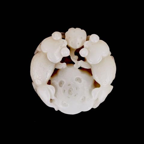 Appraisal: A White Jade Carving of Two Fish and Lotus Condition