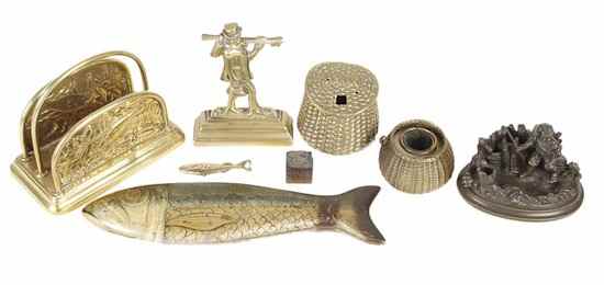 Appraisal: Fish related desktop items comprising a patinated brone match holder