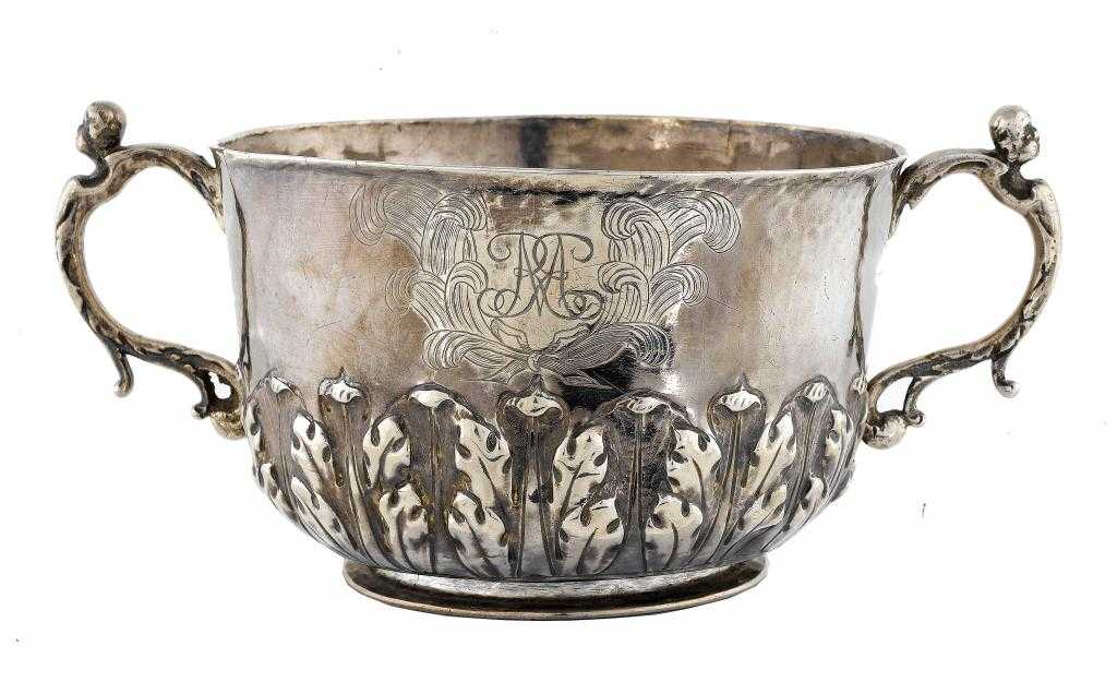 Appraisal: A CHARLES II PORRINGER the urnular bowl with slightly flared