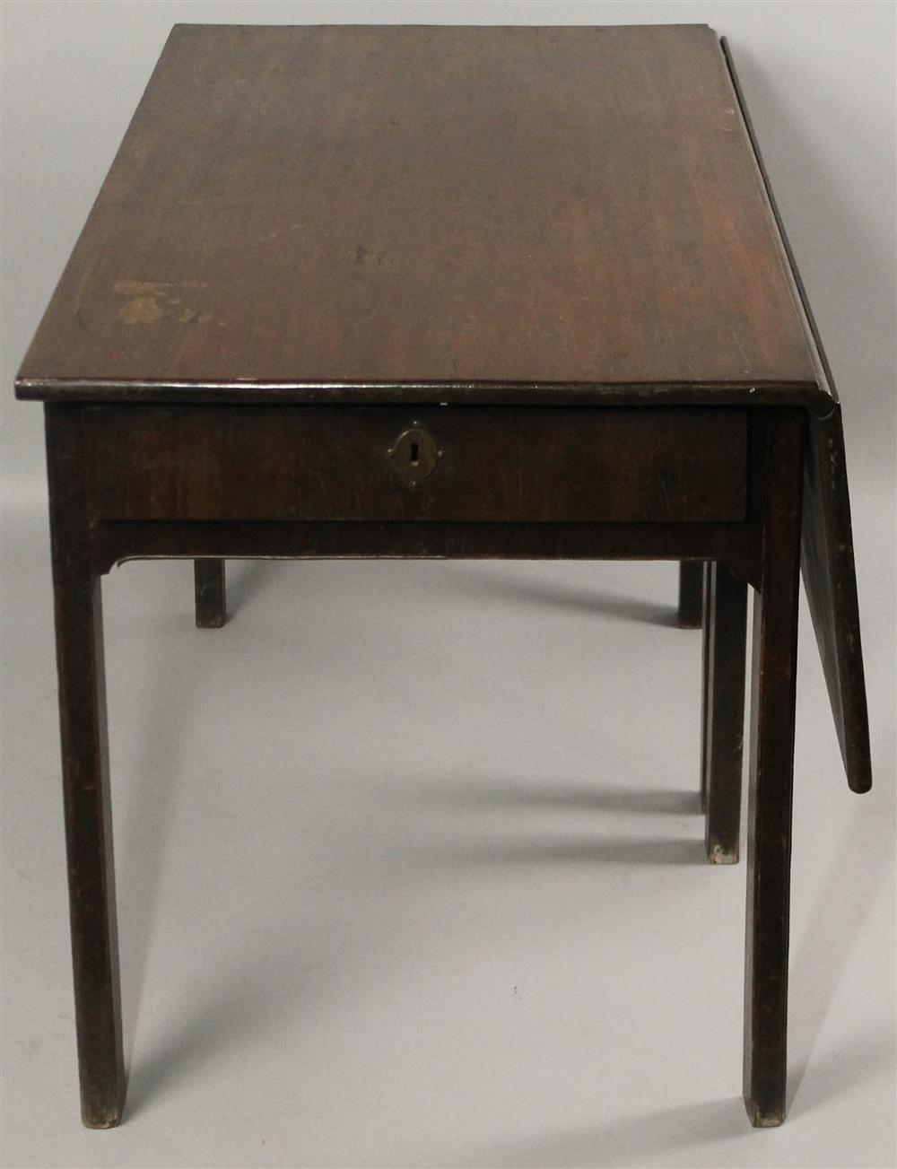 Appraisal: GEORGIAN MAHOGANY LIBRARY TABLE WITH SIDE DRAWERS having a rectangular