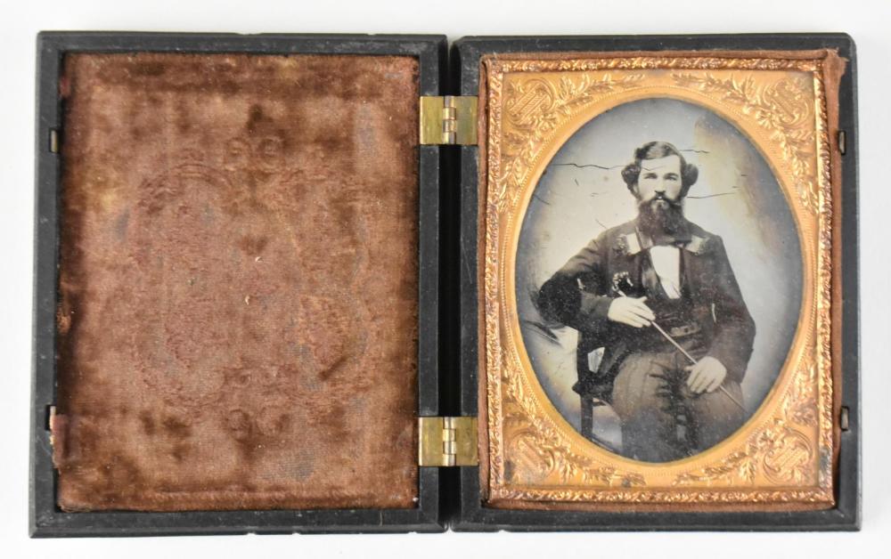 Appraisal: PLATE AMBROTYPE OF A GENTLEMANMid th Century The seated gentleman