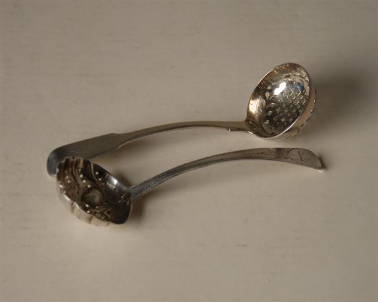 Appraisal: Two George III Sterling Sugar Sifters one with London marks