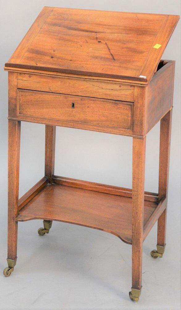 Appraisal: Writing table having one drawer and lower tier shelf with