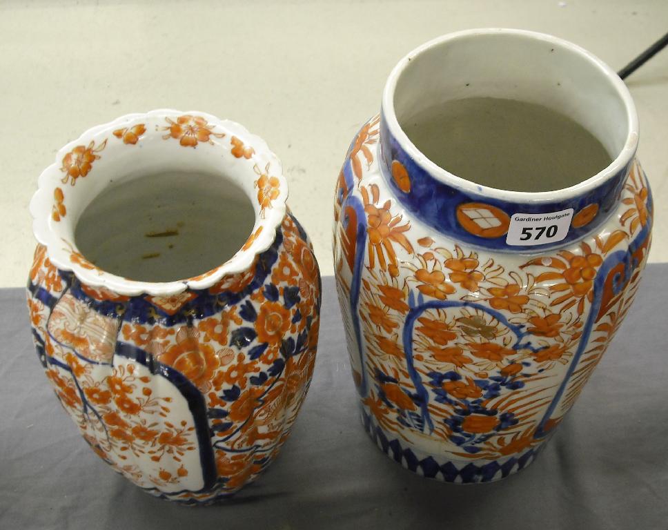 Appraisal: Two Japanese Imari fluted baluster vases and high