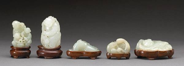 Appraisal: A group of five miniature jade carvings The first two